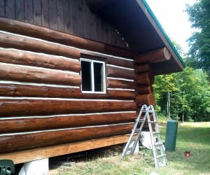 log-cabin-before-and-after-cleaning-siding