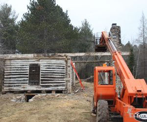 historic-log-cabin-roof-removed-view-of-lift-equipment