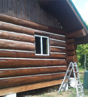 log-cabin-siding-restoration-before-and-after