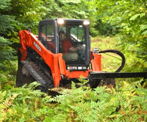 skid-steer-and-attachment-used-for-brush-control